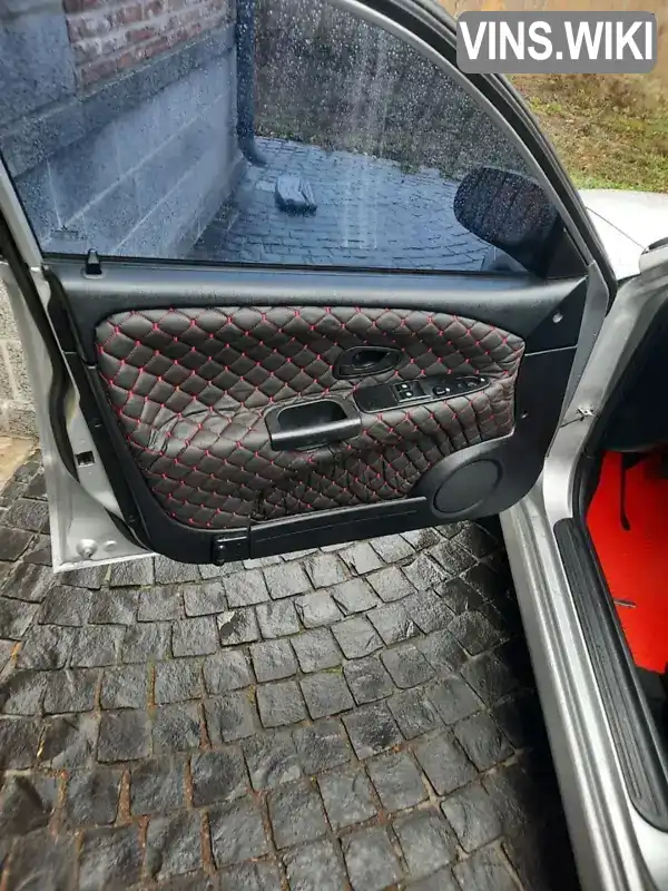 Mitsubishi Carisma 2001, фото з оголошення 2 з 16, VIN XMCLNDA2A2F009021