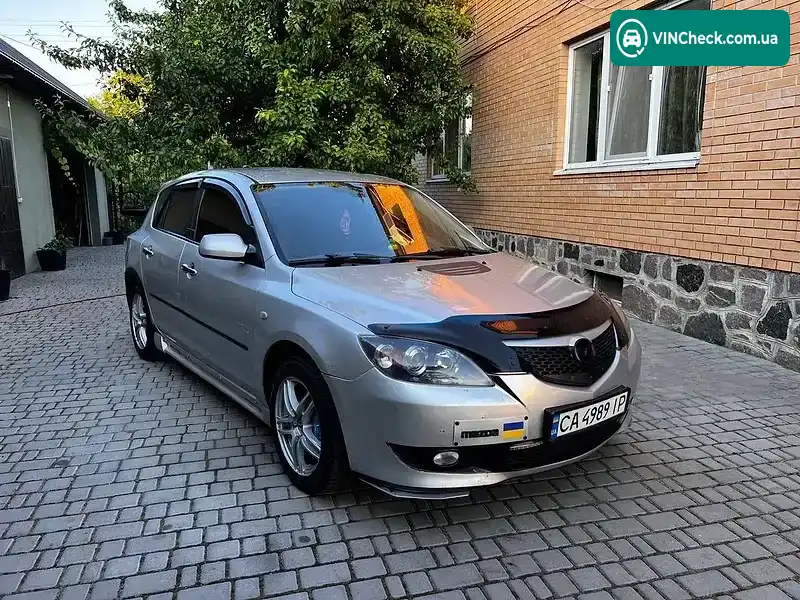 Mazda 3 2003, фото з оголошення 2 з 16, VIN JMZBK14Z241108934