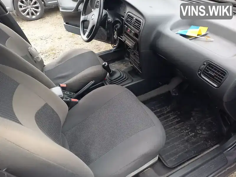 Nissan Primera 1991, фото з оголошення 2 з 12, VIN JN1TCAW10U0007114