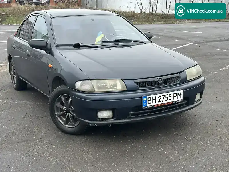 Mazda 323 1997, фото з оголошення 1 з 17, VIN JMZBA125200591161