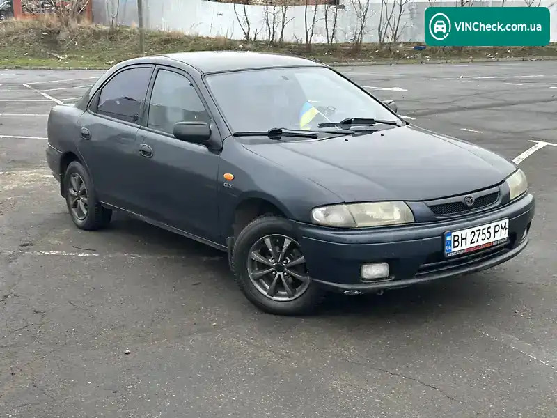 Mazda 323 1997, фото з оголошення 2 з 17, VIN JMZBA125200591161