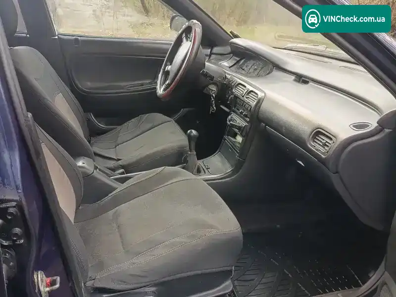Mazda 626 1995, фото з оголошення 2 з 12, VIN JMZGE14B201414581