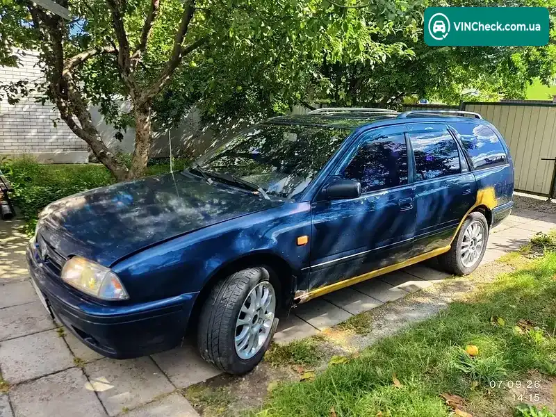 Nissan Primera 1992, фото з оголошення 2 з 13, VIN JN1TCAW10U0013663