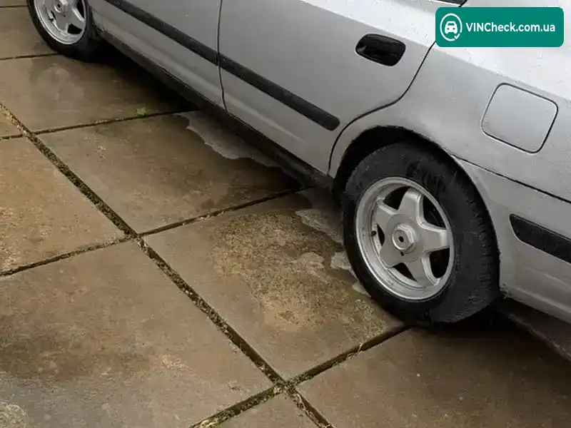 Hyundai Elantra 2002, фото з оголошення 2 з 15, VIN KMHDM41BP2U460491