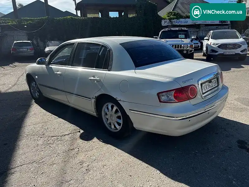 Kia Opirus 2005, фото з оголошення 2 з 20, VIN KNELD223355052348