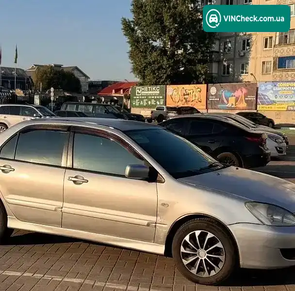 Mitsubishi Lancer 2004, фото з оголошення 2 з 11, VIN JMBSNCS3A5U006389