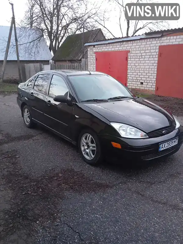 Ford Focus 2003, фото з оголошення 2 з 12, VIN 1FAFP34373W290952