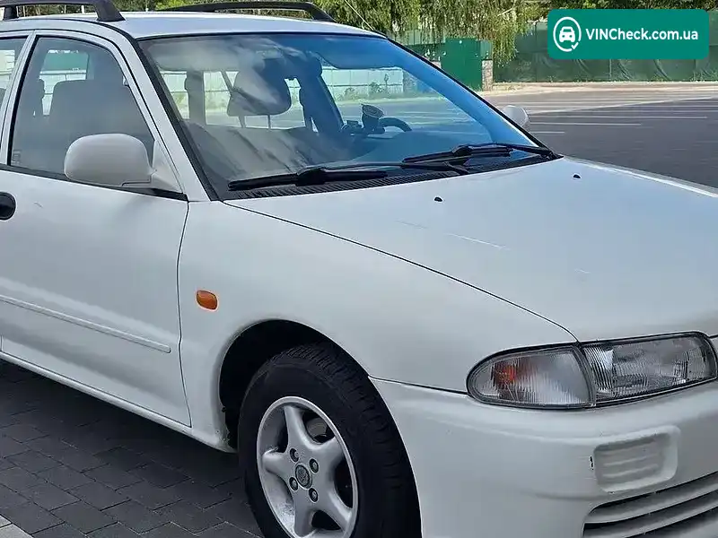 Mitsubishi Lancer 1998, фото з оголошення 1 з 13, VIN JMBLNCB4WWU501083