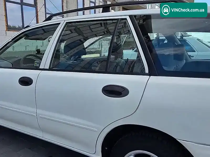 Mitsubishi Lancer 1998, фото з оголошення 2 з 13, VIN JMBLNCB4WWU501083