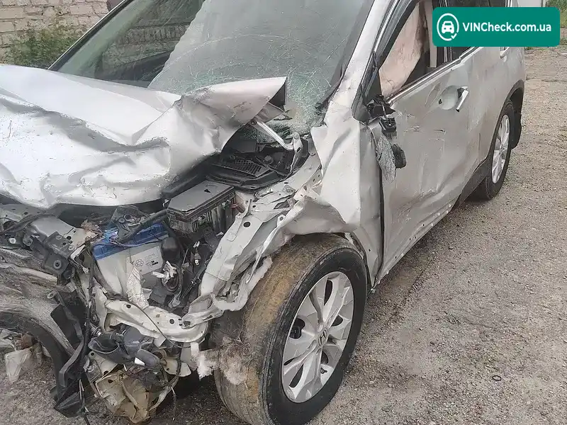 Honda CR-V 2013, фото з оголошення 2 з 12, VIN 2HKRM4H70DH674534
