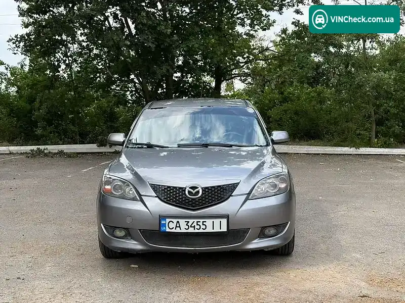 Mazda 3 2004, фото з оголошення 2 з 11, VIN JMZBK14Z251152560