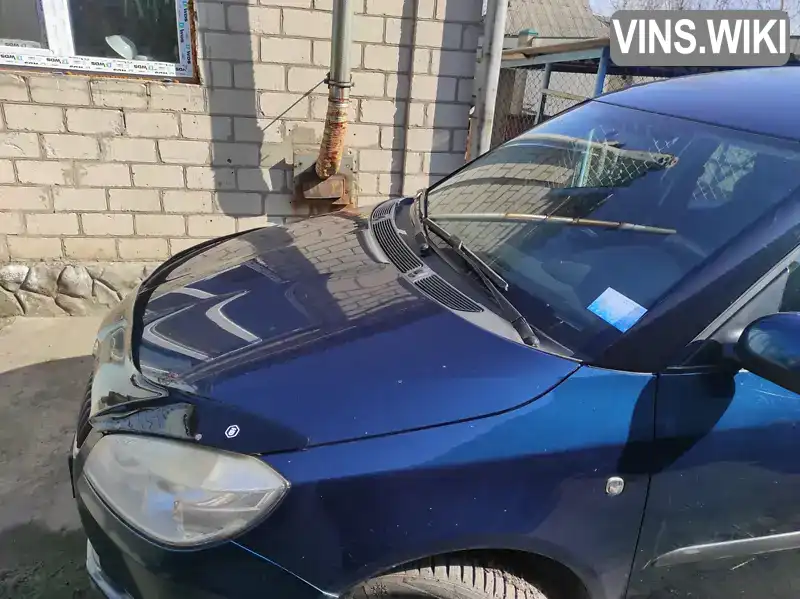 Skoda Roomster 2011, фото з оголошення 2 з 13, VIN TMBNL25J8C7006750