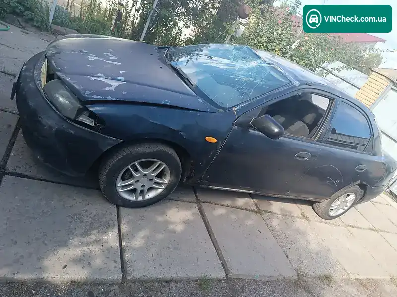 Mazda 323 1998, фото з оголошення 1 з 5, VIN JMZBA125500599073
