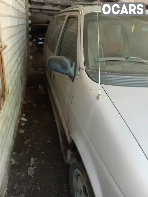 Plymouth Voyager 1995, фото з оголошення 2 з 12, VIN 2P4FH25K4SR259331