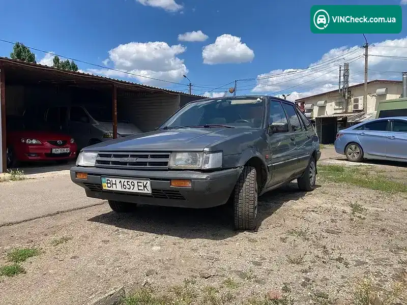 Toyota Corolla 1987, фото з оголошення 2 з 12, VIN JT1L0EE8005104958
