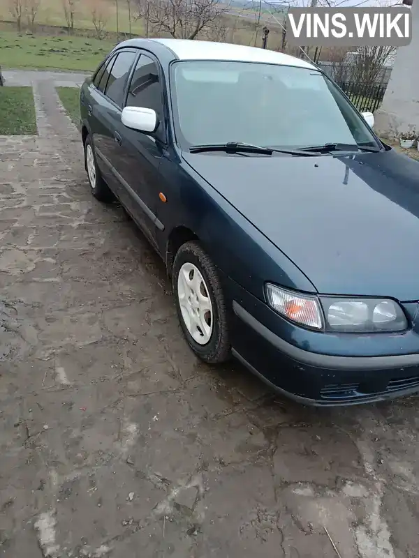 Mazda 626 1999, фото з оголошення 2 з 21, VIN JMZGF14S201175499