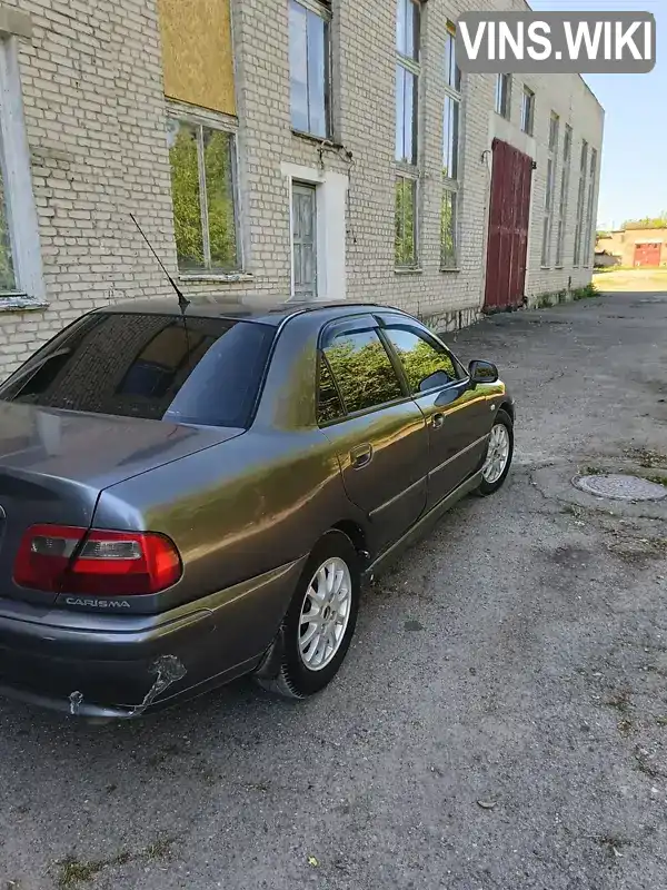 Mitsubishi Carisma 2003, фото з оголошення 1 з 10, VIN XMCSNDA1A3F040705
