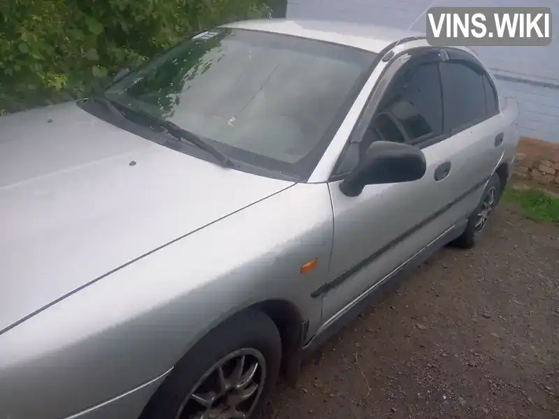 Mitsubishi Carisma 1997, фото з оголошення 2 з 11, VIN XMCLNDA1AWF017023