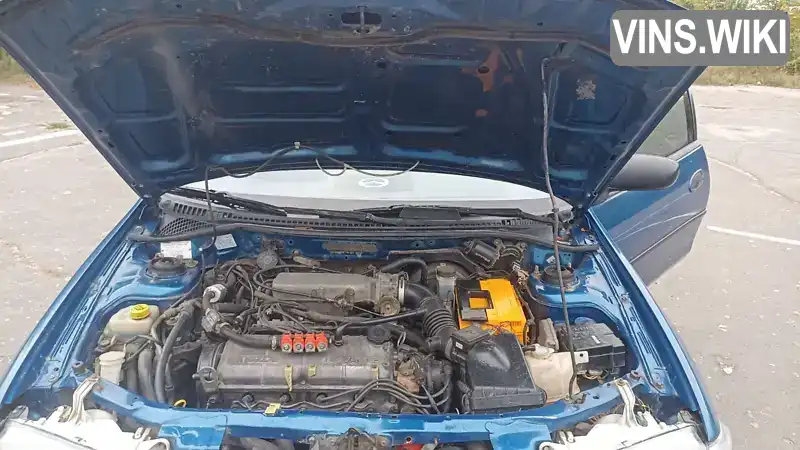 Mazda 323 1998, фото з оголошення 2 з 9, VIN JMZBA153200667288