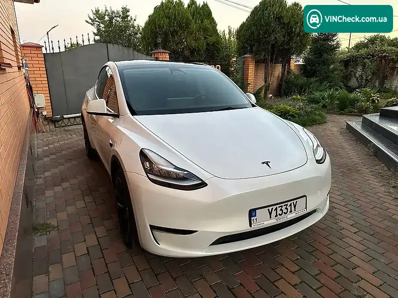 Tesla Model Y 2023, фото з оголошення 2 з 20, VIN 7SAYGDEE1PA068829