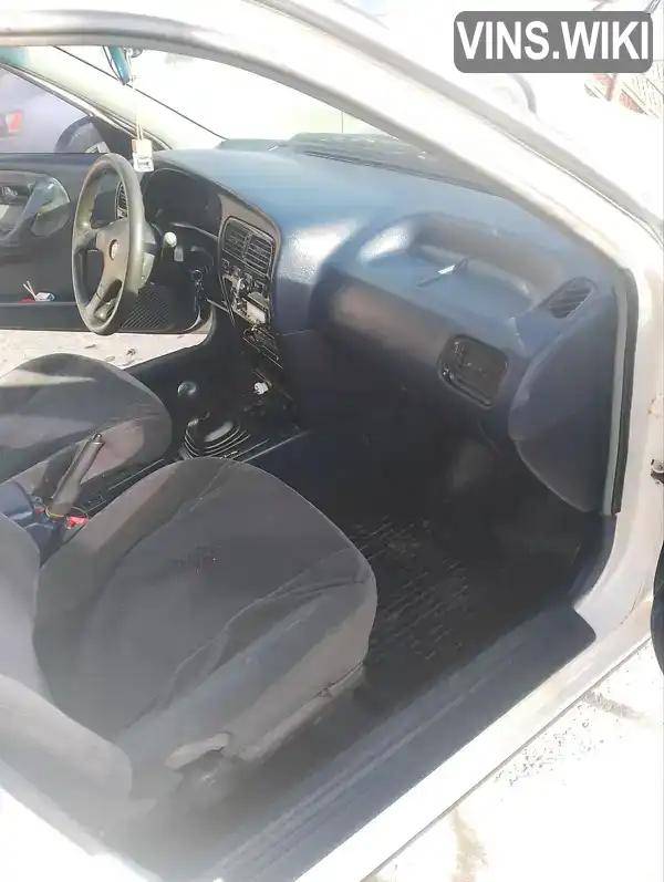 Nissan Primera 1992, фото з оголошення 2 з 9, VIN SJNBAAP10U0201884