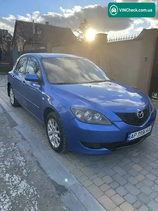 Mazda 3 2004, фото з оголошення 2 з 19, VIN JMZBK14Z551145830