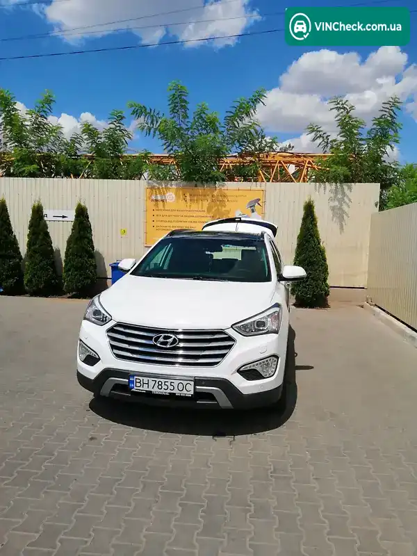 Hyundai Grand Santa Fe 2014, фото з оголошення 1 з 11, VIN KMHSN81DXEU049595