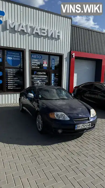 Hyundai Coupe 2002, фото з оголошення 2 з 10, VIN KMHHN61BP2U053327