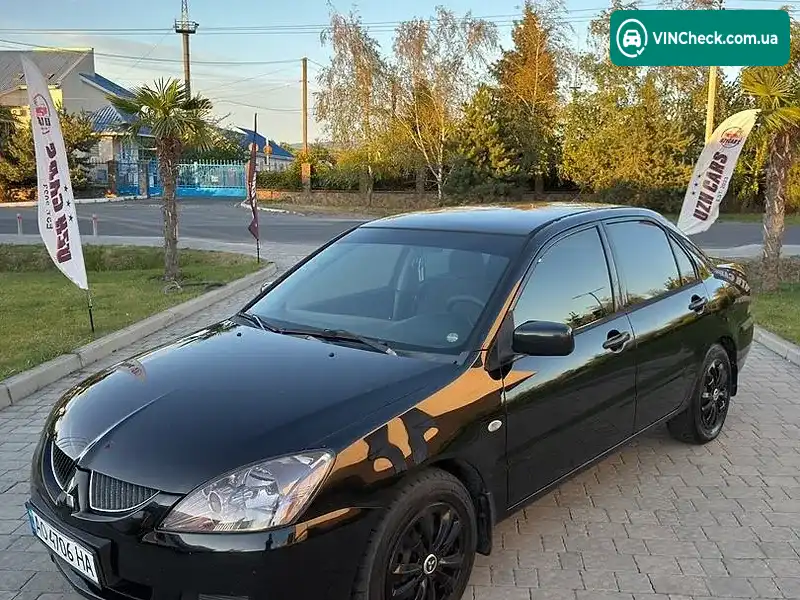 Mitsubishi Lancer 2004, фото з оголошення 2 з 13, VIN JMBSNCS3A4U006005