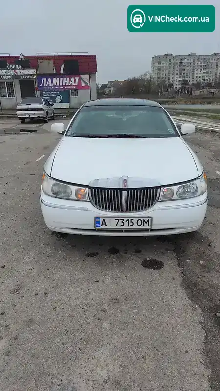 Lincoln Town Car 1999, фото з оголошення 2 з 12, VIN 1LNFM82W1XY606199