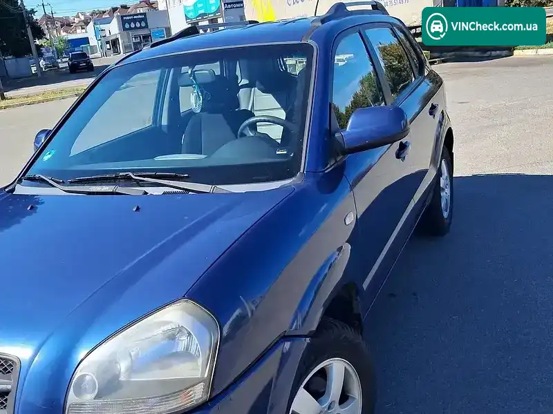 Hyundai Tucson 2006, фото з оголошення 2 з 20, VIN KMHJN81BP7U563673