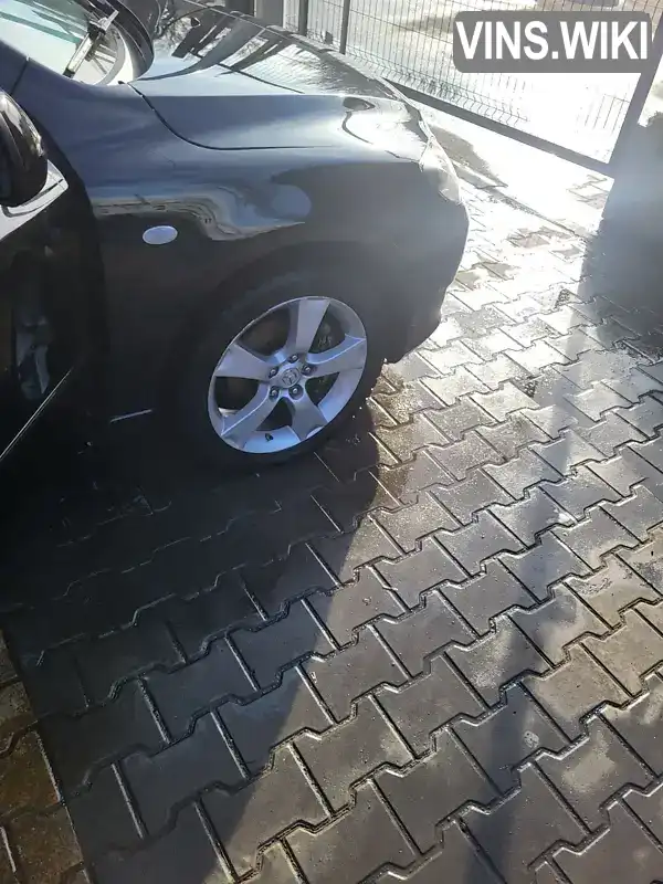 Mazda 3 2005, фото з оголошення 2 з 14, VIN JMZBK14F251217148