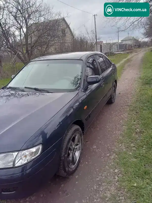 Mazda 626 2000, фото з оголошення 1 з 18, VIN JMZGF14R201429009