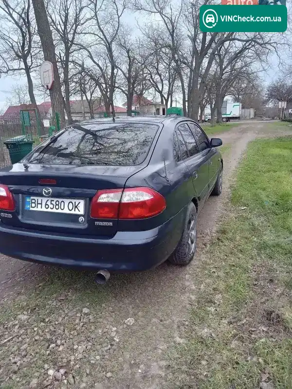 Mazda 626 2000, фото з оголошення 2 з 18, VIN JMZGF14R201429009