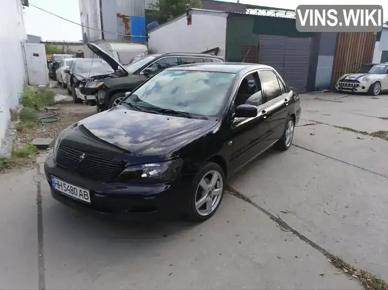 Mitsubishi Lancer 2002, фото з оголошення 2 з 11, VIN JA3AJ26EX3U010840