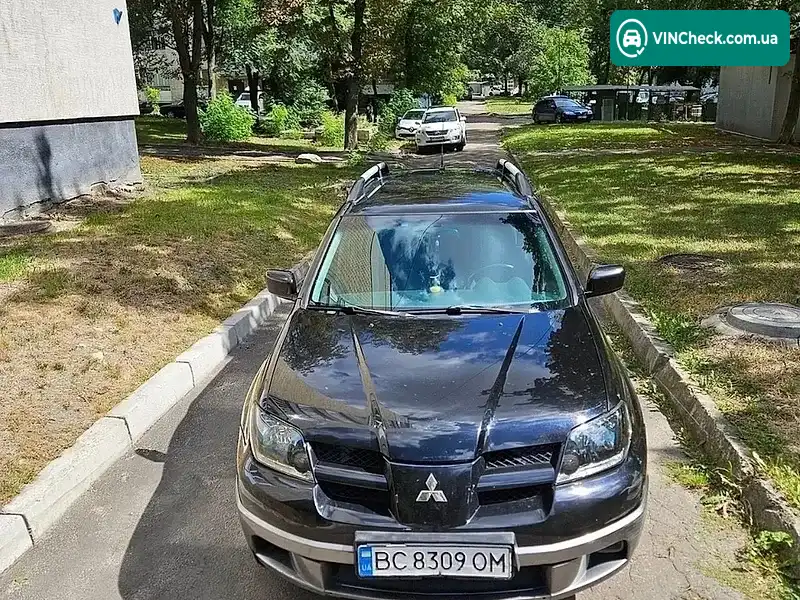Mitsubishi Outlander 2003, фото з оголошення 2 з 11, VIN JMBXNCU2W4U001564