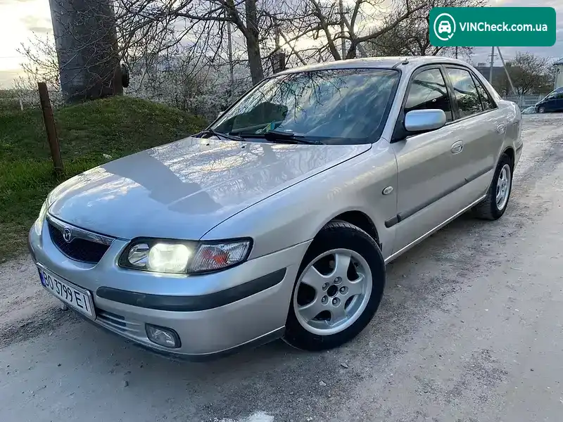 Mazda 626 1998, фото з оголошення 2 з 21, VIN JMZGE14J201239124