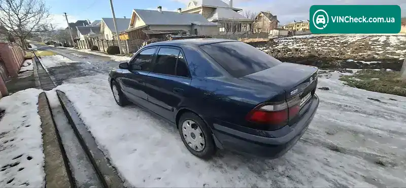 Mazda 626 1999, фото з оголошення 2 з 11, VIN JMZGF12F201184166