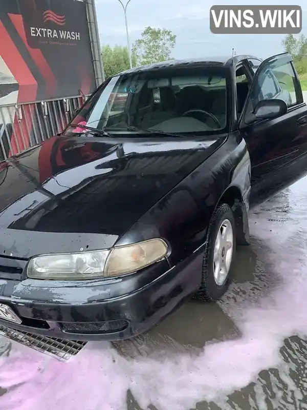 Mazda 626 1993, фото з оголошення 1 з 9, VIN JMZGE12J201101396