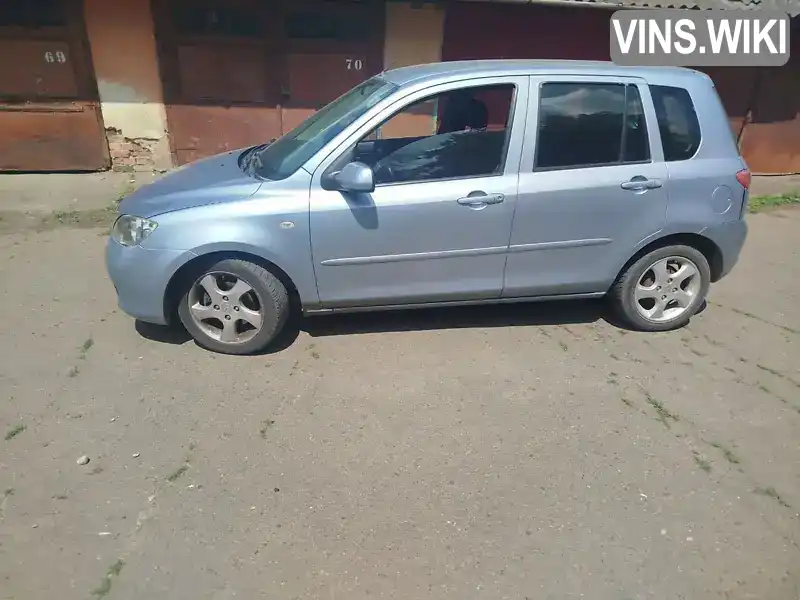 Mazda 2 2004, фото з оголошення 2 з 9, VIN JMZNE2WPJN4S00116