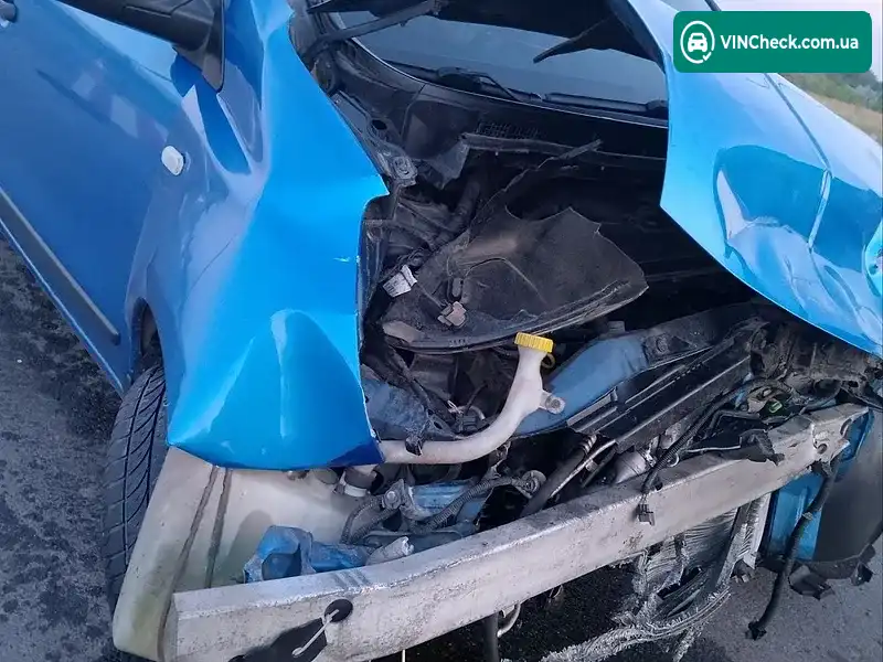 Nissan Note 2006, фото з оголошення 2 з 18, VIN SJNFAAE11U1047492
