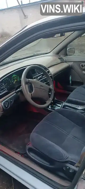 Ford Contour 1995, фото з оголошення 2 з 9, VIN 1FALP65LXSK189025