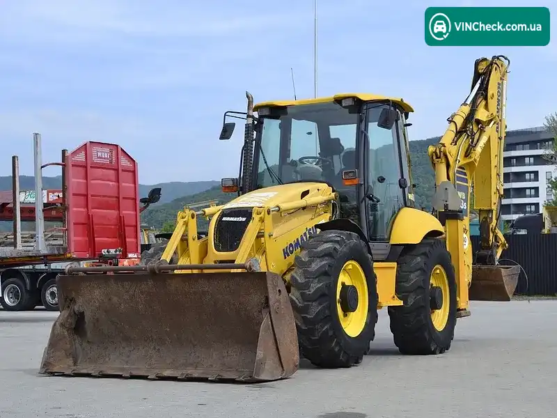 Komatsu Wb 2009, фото з оголошення 2 з 20, VIN KMTWB024E77F20393