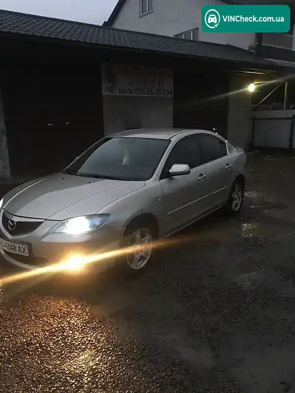 Mazda 3 2004, фото з оголошення 2 з 9, VIN 1VWBV7A32FC044744