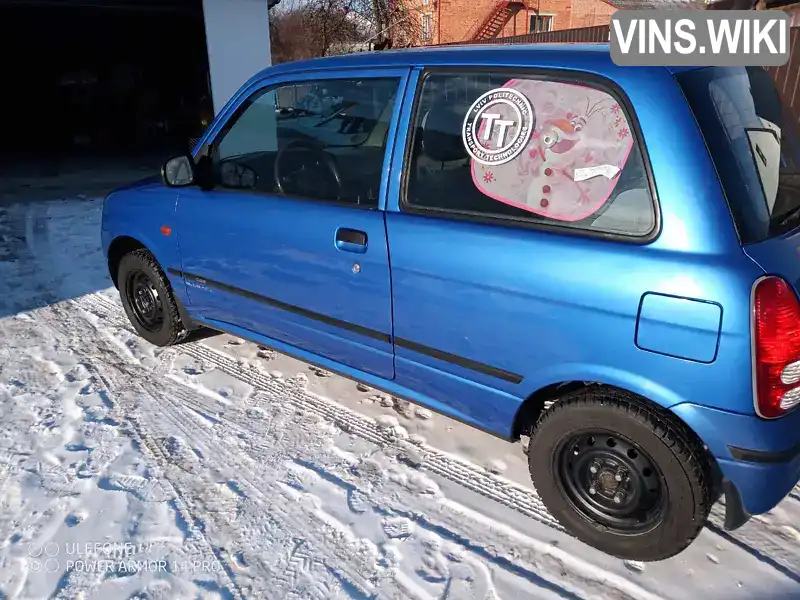 Daihatsu Cuore 2002, фото з оголошення 2 з 20, VIN JDAL701S001047628