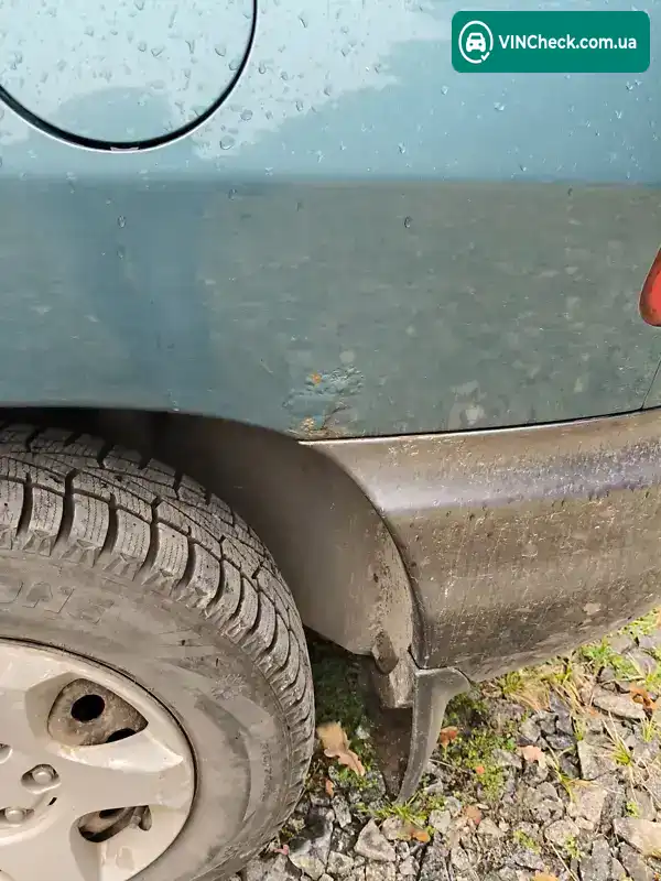 Hyundai Santa FE 2002, фото з оголошення 2 з 14, VIN KMHSC81BP2U286438