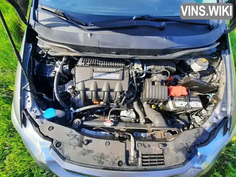 Honda Insight 2012, фото з оголошення 2 з 21, VIN JHMZE2850CS204456