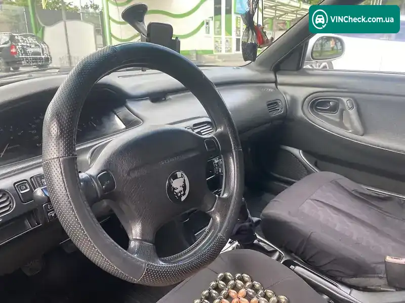 Mazda 626 1995, фото з оголошення 2 з 13, VIN JMZGE14B201503144