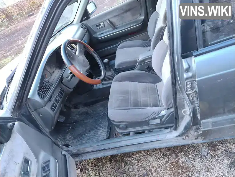 Mazda 626 1990, фото з оголошення 2 з 8, VIN JMZGV12D201204666