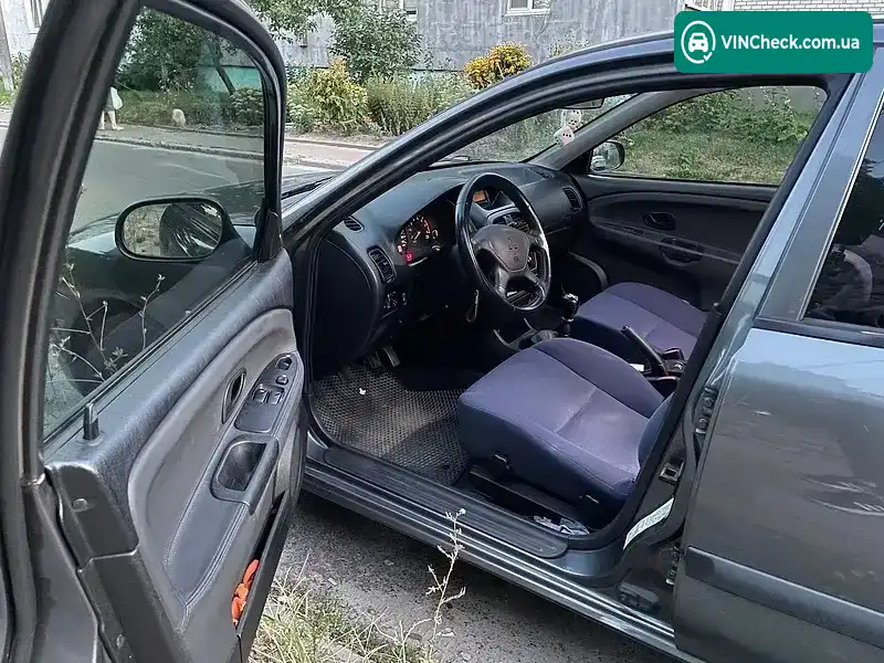 Mitsubishi Carisma 2003, фото з оголошення 1 з 6, VIN XMCLNDA1A3F018869